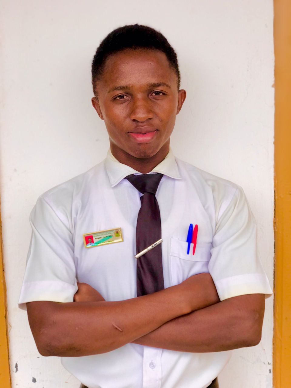 ROBERT SANYIMIA